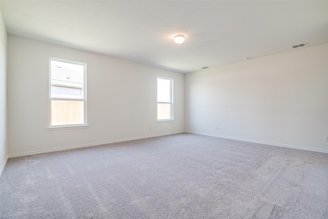 4031 Bedford Dr, Crandall, TX 75114 - unfurnished room featuring baseboards, visible vents, and carpet floors