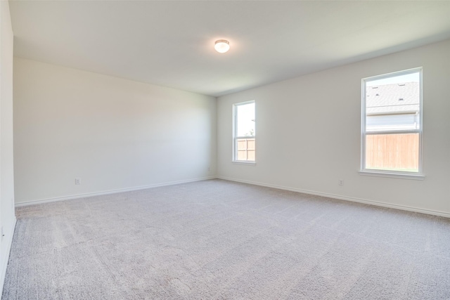 4031 Bedford Dr, Crandall, TX 75114 - empty room featuring baseboards and light carpet