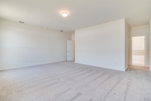 4031 Bedford Dr, Crandall, TX 75114 - unfurnished room featuring light colored carpet, baseboards, and visible vents