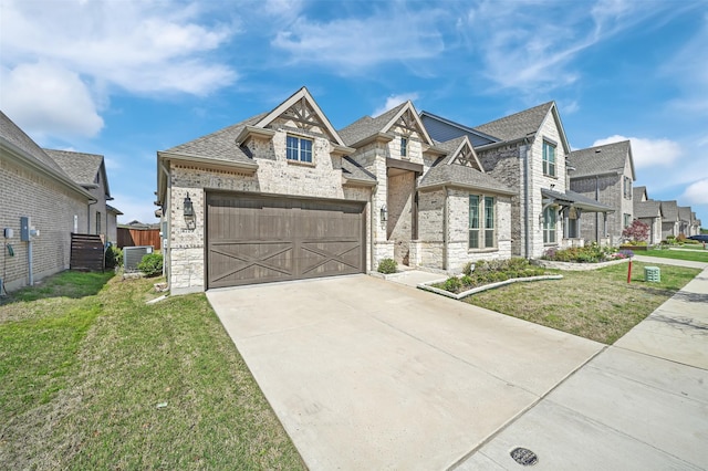 4729 Brockwell Dr, Carrollton, TX 75010 - view of front facade with central AC, a front yard, brick siding, a garage, and concrete driveway