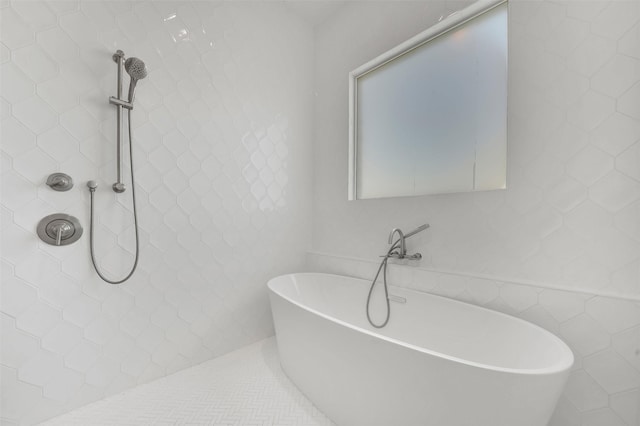 4729 Brockwell Dr, Carrollton, TX 75010 - full bathroom with a freestanding bath, tiled shower, and tile walls