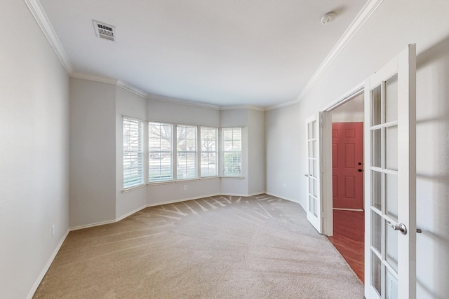 104 Bayonne Dr, Mansfield, TX 76063 - spare room featuring french doors, ornamental molding, baseboards, and carpet floors