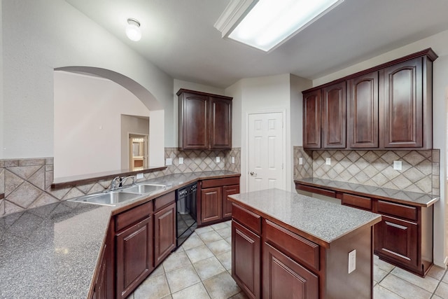 104 Bayonne Dr, Mansfield, TX 76063 - kitchen featuring dishwasher, decorative backsplash, arched walkways, and a sink