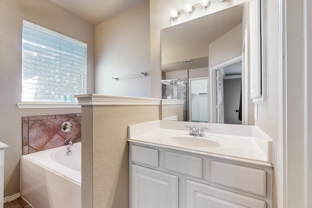 104 Bayonne Dr, Mansfield, TX 76063 - bathroom with a garden tub and vanity