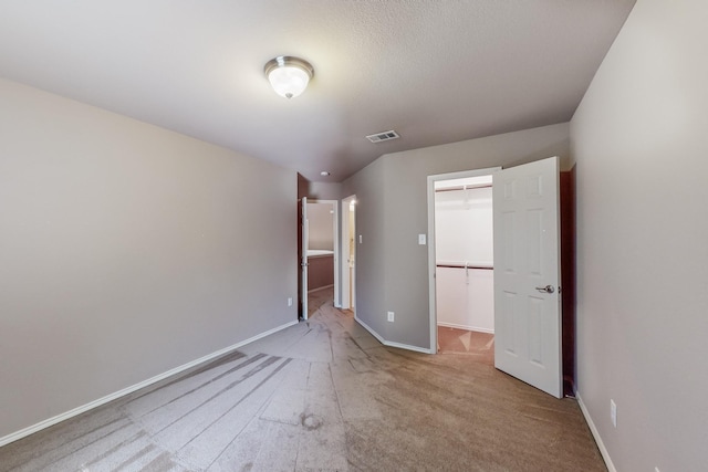 104 Bayonne Dr, Mansfield, TX 76063 - unfurnished bedroom featuring baseboards, a spacious closet, carpet, and a closet
