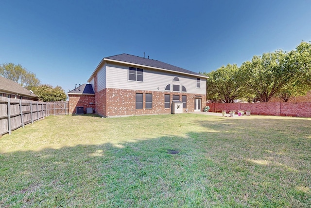 104 Bayonne Dr, Mansfield, TX 76063 - back of property with brick siding, central air condition unit, and a patio area