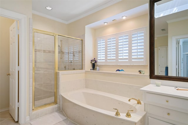 full bath featuring ornamental molding, a shower stall, vanity, tile patterned floors, and a garden tub