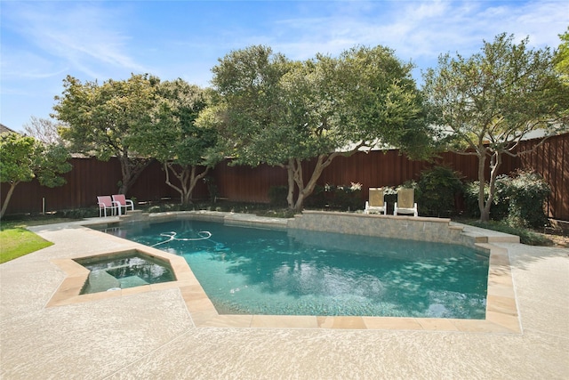view of swimming pool with a fenced backyard, an in ground hot tub, a fenced in pool, and a patio