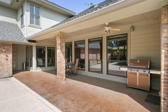 view of patio with ceiling fan and a grill