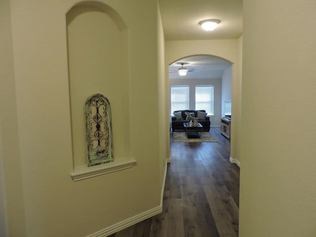 112 Westview Dr, Gun Barrel City, TX 75156 - hallway featuring arched walkways and dark wood-style floors