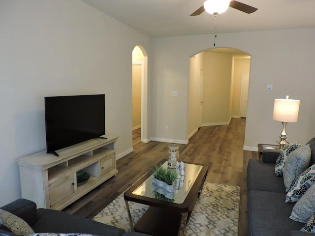 112 Westview Dr, Gun Barrel City, TX 75156 - living room with arched walkways, ceiling fan, and wood finished floors