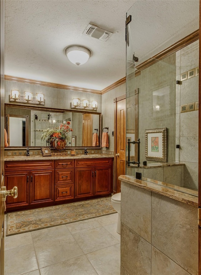 625 Estates Dr, Copper Canyon, TX 75077 - full bath featuring crown molding, a shower stall, a textured ceiling, double vanity, and toilet