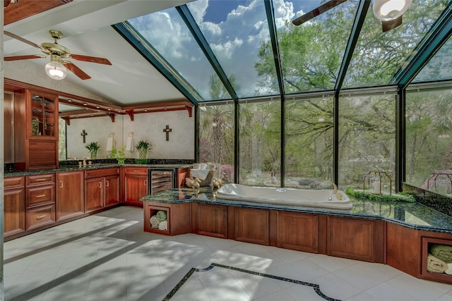 625 Estates Dr, Copper Canyon, TX 75077 - sunroom / solarium featuring beverage cooler, lofted ceiling, exterior kitchen, a ceiling fan, and healthy amount of natural light