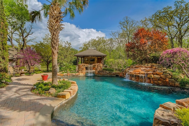 625 Estates Dr, Copper Canyon, TX 75077 - outdoor pool with a gazebo, a patio area, and a bar
