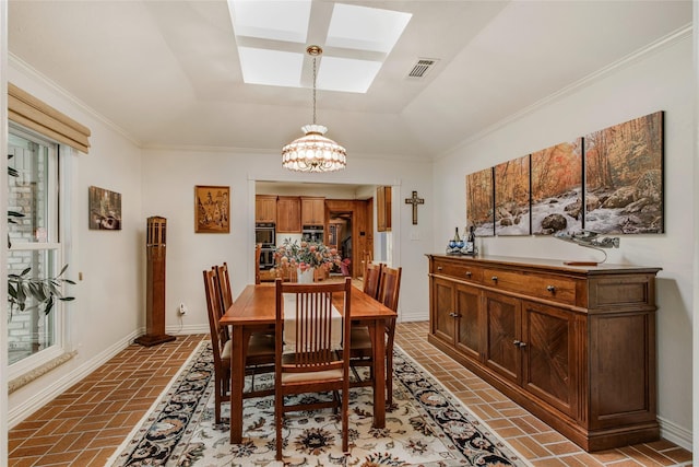 625 Estates Dr, Copper Canyon, TX 75077 - dining area featuring brick floors, a skylight, a chandelier, a tray ceiling, and baseboards