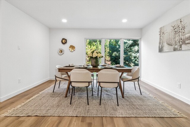 15712 Terrace Lawn Cir, Dallas, TX 75248 - dining room with wood finished floors and recessed lighting