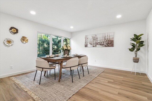 15712 Terrace Lawn Cir, Dallas, TX 75248 - dining room with light wood-style floors and recessed lighting