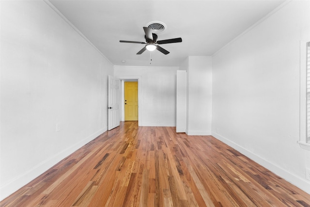 1909 Sycamore Dr, Mesquite, TX 75149 - empty room featuring light wood-style flooring, a ceiling fan, ornamental molding, and baseboards