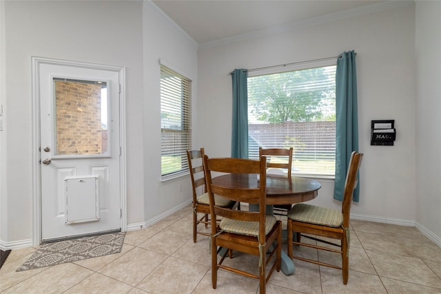 5100 Tortola Ln, Fort Worth, TX 76244 - dining area with ornamental molding, light tile patterned floors, and baseboards