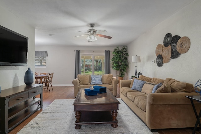 216 Belmont St, Hurst, TX 76053 - living area with ceiling fan, wood finished floors, and baseboards