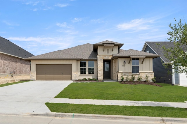 2900 Barbary, Mckinney, TX 75071 - prairie-style home with a front lawn, driveway, stone siding, and an attached garage