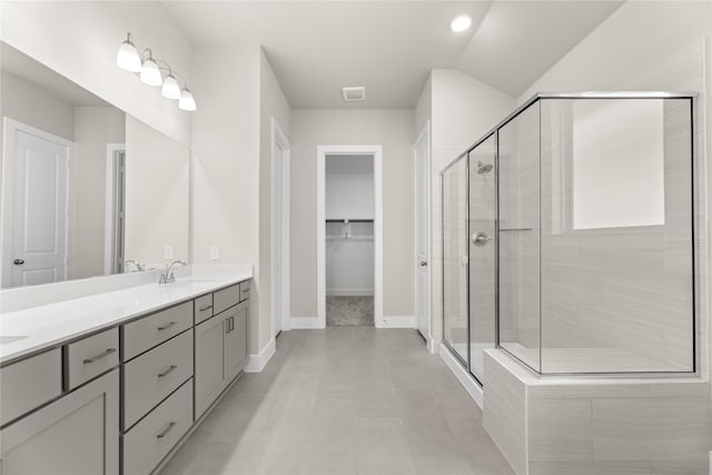 2900 Barbary, Mckinney, TX 75071 - full bathroom featuring double vanity, visible vents, a spacious closet, and a stall shower