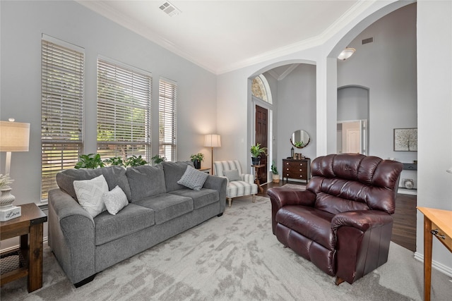 953 Waterbury Way, Keller, TX 76248 - carpeted living area featuring crown molding and arched walkways