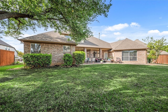 953 Waterbury Way, Keller, TX 76248 - rear view of property featuring a patio, brick siding, and a shingled roof