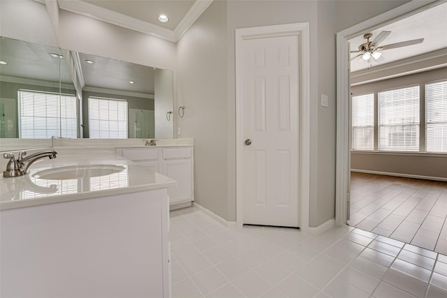 4032 Guthrie Dr, Plano, TX 75024 - full bathroom with crown molding, double vanity, a ceiling fan, tile patterned floors, and recessed lighting