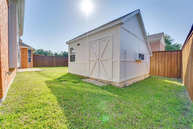 4032 Guthrie Dr, Plano, TX 75024 - view of shed with a fenced backyard and a wall unit AC
