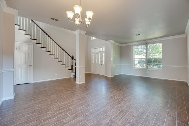 4032 Guthrie Dr, Plano, TX 75024 - unfurnished living room with ornate columns, wood finished floors, stairs, and ornamental molding