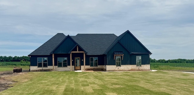 421 Schneider Rd, Sherman, TX 75090 - view of front of home with a shingled roof, a front lawn, and board and batten siding