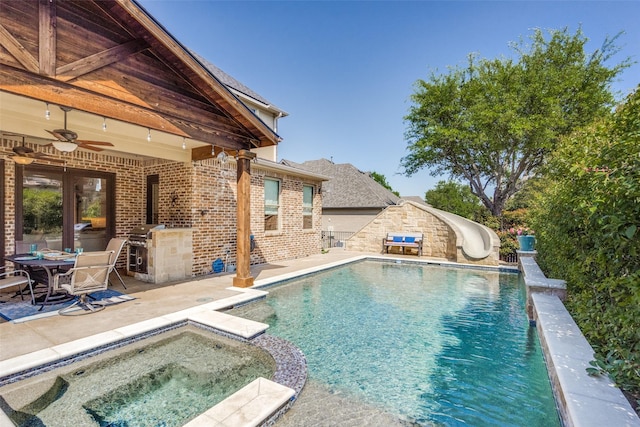 2890 Creekwood Ln, Prosper, TX 75078 - view of pool with a water slide, a ceiling fan, a patio, a pool with connected hot tub, and grilling area