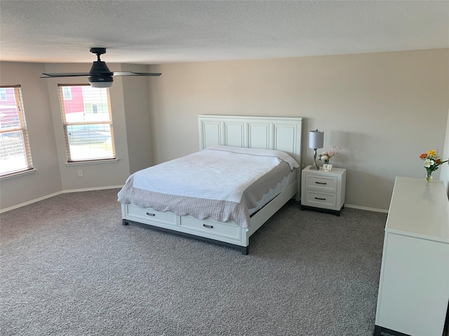 9140 Blackstone Dr, Providence Village, TX 76227 - bedroom featuring baseboards, a ceiling fan, carpet, and a textured ceiling