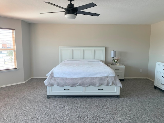 9140 Blackstone Dr, Providence Village, TX 76227 - bedroom featuring baseboards, dark carpet, a ceiling fan, and a textured ceiling