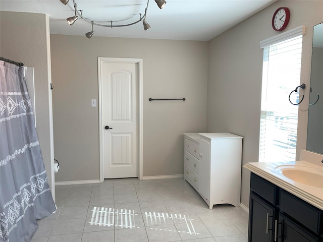 9140 Blackstone Dr, Providence Village, TX 76227 - bathroom featuring baseboards, a shower with shower curtain, tile patterned flooring, and vanity