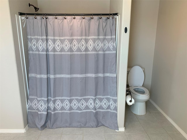 9140 Blackstone Dr, Providence Village, TX 76227 - full bath with toilet, curtained shower, tile patterned flooring, and baseboards