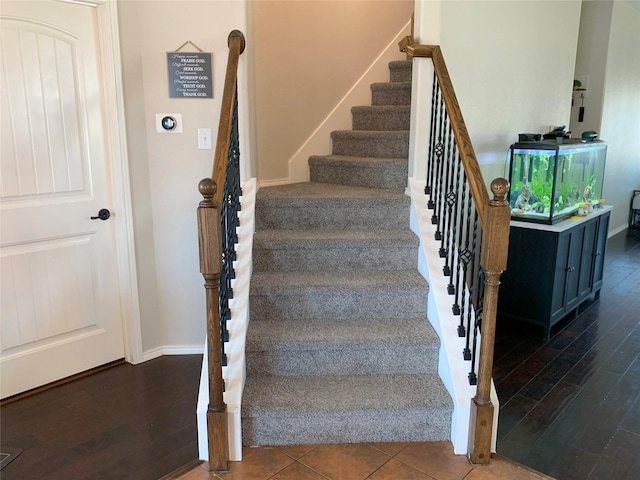 9140 Blackstone Dr, Providence Village, TX 76227 - staircase featuring baseboards and wood finished floors