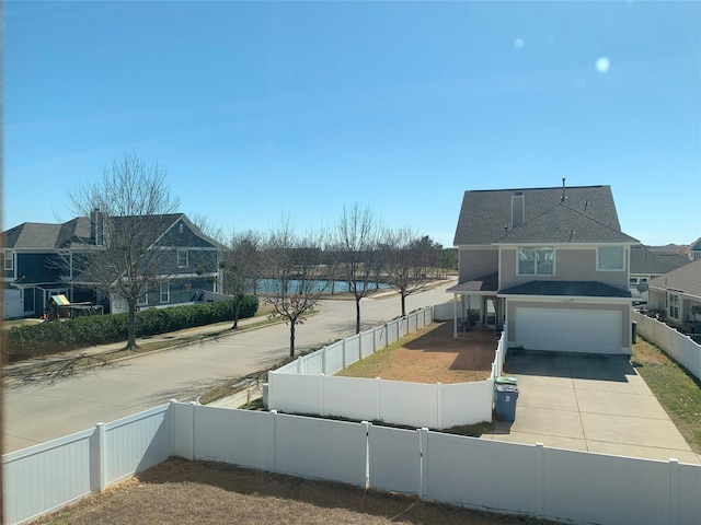 9140 Blackstone Dr, Providence Village, TX 76227 - exterior space featuring a garage, driveway, and a fenced front yard