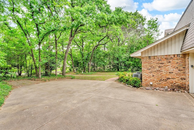 2402 Winewood Ln, Arlington, TX 76013 - view of patio with central air condition unit