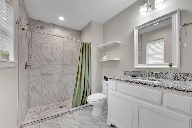 530 E Day St, Denison, TX 75021 - full bathroom with a tile shower, toilet, marble finish floor, and vanity