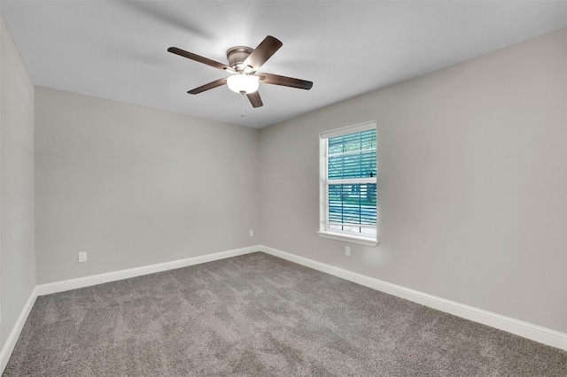 530 E Day St, Denison, TX 75021 - carpeted empty room featuring baseboards and a ceiling fan