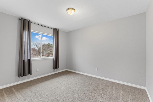 322 Ashley Oak Ln, Lake Dallas, TX 75065 - spare room featuring baseboards and carpet floors