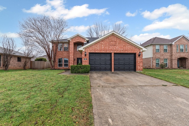 322 Ashley Oak Ln, Lake Dallas, TX 75065 - traditional home featuring brick siding, a front yard, a garage, and concrete driveway