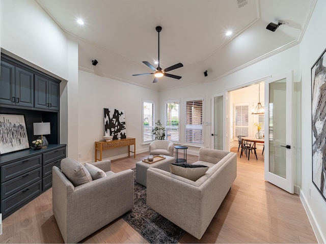 5454 Pebble Creek Dr, Celina, TX 75078 - living room featuring light wood-type flooring, ornamental molding, baseboards, and a ceiling fan