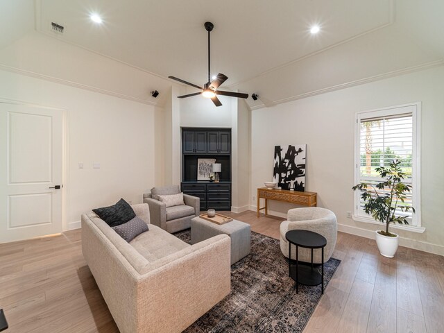 5454 Pebble Creek Dr, Celina, TX 75078 - living room featuring a ceiling fan, baseboards, light wood-type flooring, and lofted ceiling