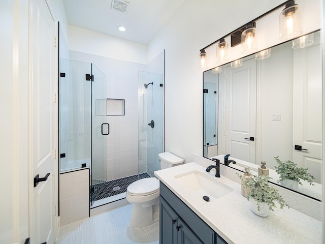 5454 Pebble Creek Dr, Celina, TX 75078 - bathroom featuring vanity, a stall shower, tile patterned floors, toilet, and visible vents