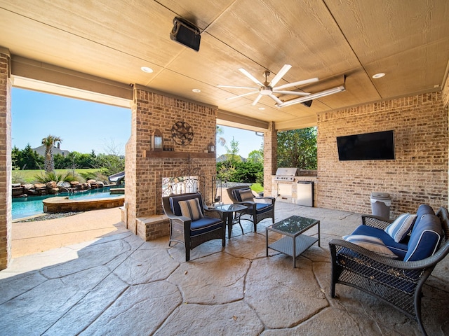 5454 Pebble Creek Dr, Celina, TX 75078 - view of patio featuring ceiling fan, an outdoor living space with a fireplace, grilling area, exterior kitchen, and an outdoor pool