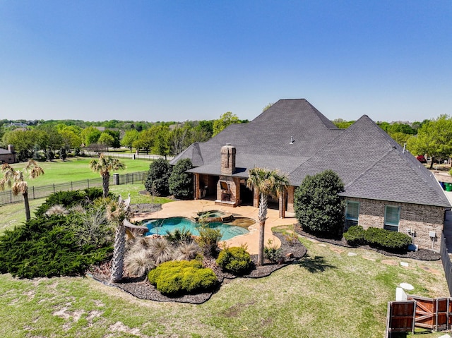 5454 Pebble Creek Dr, Celina, TX 75078 - view of pool with a yard, a patio, a fenced backyard, and a pool with connected hot tub