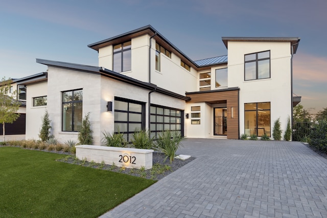 2012 Whitwood Cv, Westlake, TX 76262 - contemporary home with an attached garage, decorative driveway, a standing seam roof, a front lawn, and stucco siding